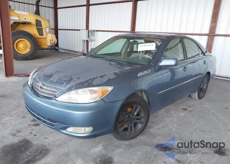 2002 Toyota Camry Xle z USA, uszkodzony, nr VIN 4T1BE32K32U542971